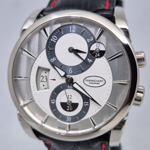 Parmigiani Fleurier Tonda Hemispheres PFC231 (11) Parmigiani Fleurier Tonda Hemispheres PFC231-1200100-HA1441 – luksusowy szwajcarski zegarek GMT z białego złota. Dostępny w ArtemWatch.