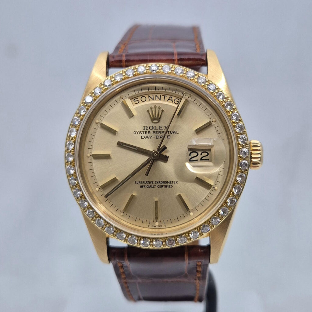 Rolex Day-Date 1803 — złoty vintage Rolex 1978 roku z diamentowym bezelem i tarczą Pie-Pan. Oryginalny zegarek kolekcjonerski. Dostępny w Artemwatch.