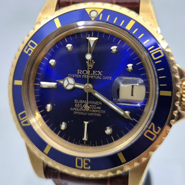 Rolex Submariner Date 1680 (10) Rolex Submariner Date 1680/8 z 1978 roku, 18-karatowe złoto, niebieska tarcza, Cal. 1570. Vintage Rolex. Dostępny w Artemwatch.