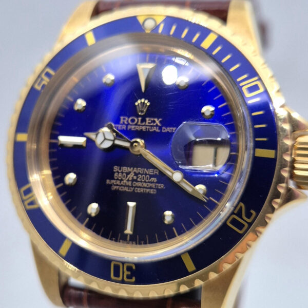 Rolex Submariner Date 1680 (12) Rolex Submariner Date 1680/8 z 1978 roku, 18-karatowe złoto, niebieska tarcza, Cal. 1570. Vintage Rolex. Dostępny w Artemwatch.